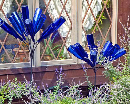 Blue bottles on wire bottle tree